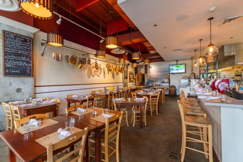 The main dining room at Salumeria 104 Midtown