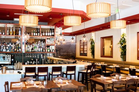 The main dining room at Salumeria 104 Weston